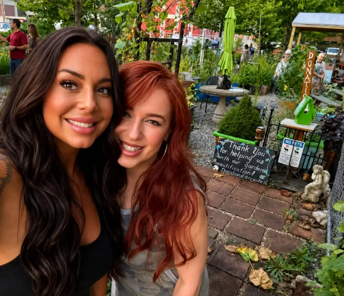 Two smiling Salon DP Lorana stylists together at a community garden event
